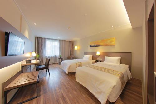 Imagen de la habitación del Hotel Home Inn Plus Beijing Chaoyangmen Beixiaojie. Foto 5