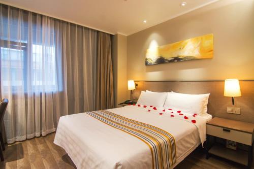 Imagen general del Hotel Home Inn Plus (Rizhao Jinan Road International Financial Center Ocean Park). Foto 4