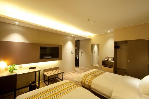 Imagen general del Hotel Home Inn Plus (Rizhao Jinan Road International Financial Center Ocean Park). Foto 9