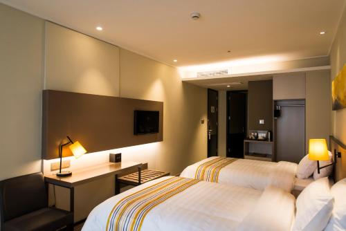 Imagen general del Hotel Home Inn Plus Shanghai Yushan Road Yuanshen Sports. Foto 4