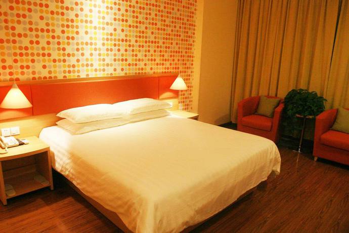 Imagen de la habitación del Hotel Home Inn Qingdao Jiushui Wanda. Foto 4