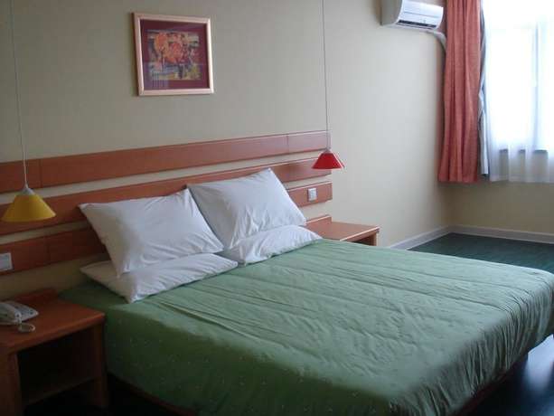 Imagen de la habitación del Hotel Home Inn Qingdao Taidong Business Area. Foto 6