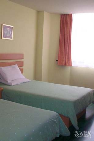 Imagen de la habitación del Hotel Home Inn Qingdao Taidong Business Area. Foto 8
