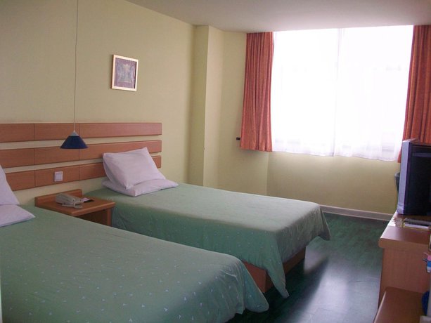 Imagen de la habitación del Hotel Home Inn Qingdao Taidong Business Area. Foto 15