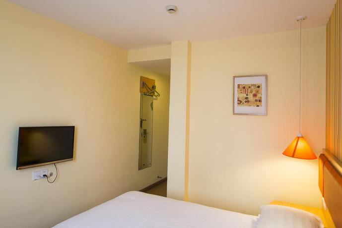Imagen de la habitación del Hotel Home Inn Qingnian Road. Foto 2