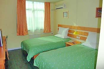 Imagen de la habitación del Hotel Home Inn Qinta. Foto 3