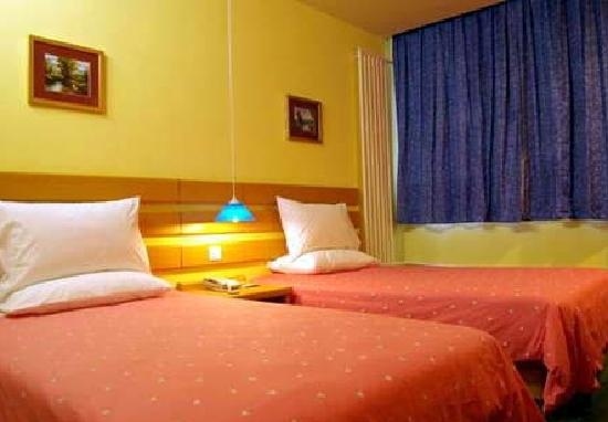 Imagen de la habitación del Hotel Home Inn Qinta. Foto 4