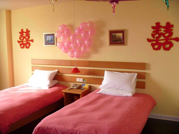 Imagen de la habitación del Hotel Home Inn Rushan Qingshan Road. Foto 5