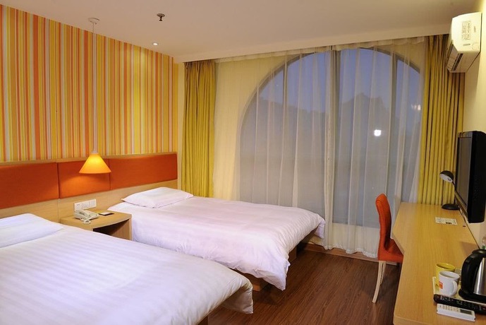 Imagen de los interiores del Hotel Home Inn Rushan Qingshan Road. Foto 13