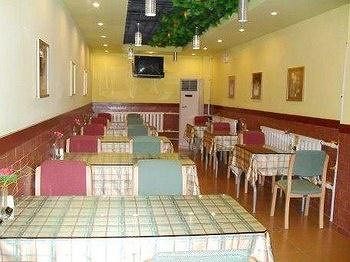 Imagen del bar/restaurante del Hotel Home Inn Shengli Street - Changchun. Foto 4