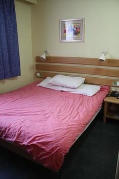 Imagen de la habitación del Hotel Home Inn, Suzhou. Foto 5
