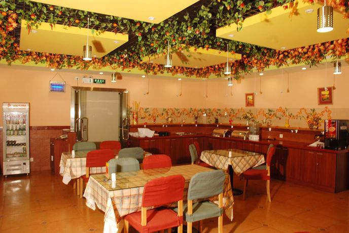 Imagen del bar/restaurante del Hotel Home Inn Taibei Yi Road Road. Foto 2