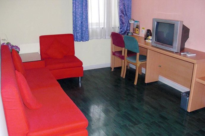 Imagen de la habitación del Hotel Home Inn Taibei Yi Road Road. Foto 8