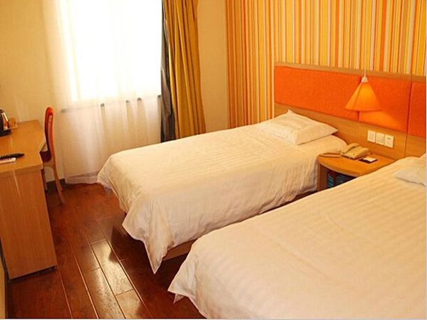 Imagen de la habitación del Hotel Home Inn Taibei Yi Road Road. Foto 9