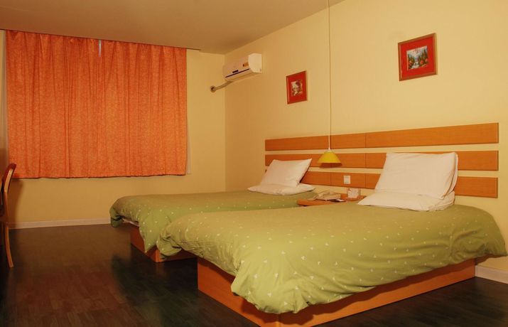 Imagen de la habitación del Hotel Home Inn Taibei Yi Road Road. Foto 10