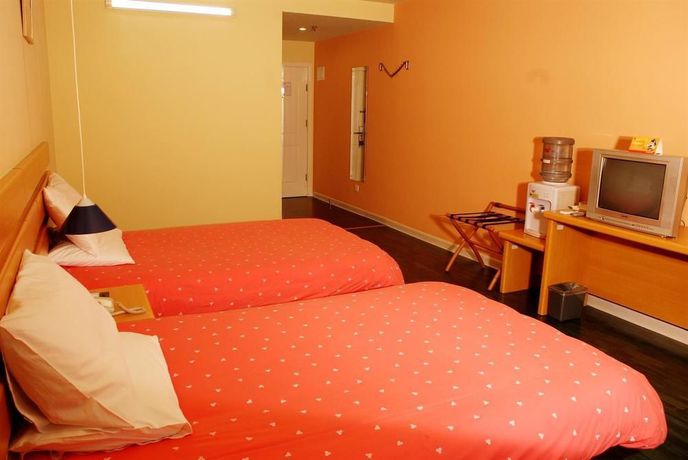 Imagen de la habitación del Hotel Home Inn Taibei Yi Road Road. Foto 11