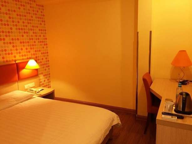 Imagen de la habitación del Hotel Home Inn Taixing Xinghuo Road. Foto 4