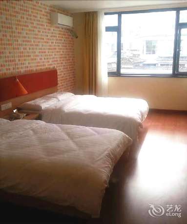 Imagen de la habitación del Hotel Home Inn- Tengchong Dongfang Road Branch. Foto 11