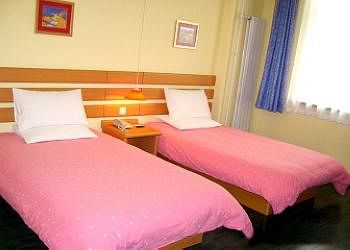 Imagen de la habitación del Hotel Home Inn Xinkai Road - Dalian. Foto 4