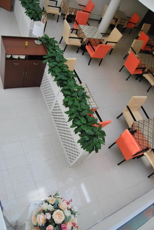 Imagen de los interiores del Hotel Home Inn Yanan West Road. Foto 12