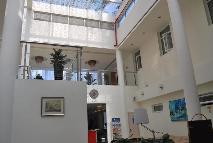 Imagen de los interiores del Hotel Home Inn Yanan West Road. Foto 13