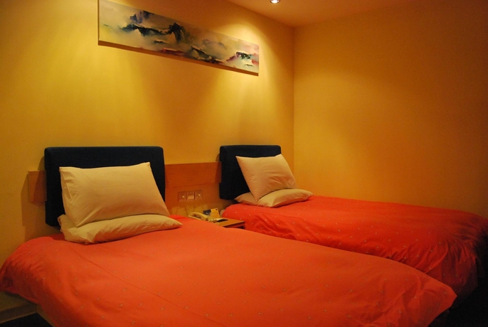 Imagen de la habitación del Hotel Home Inn Yanan West Road. Foto 3