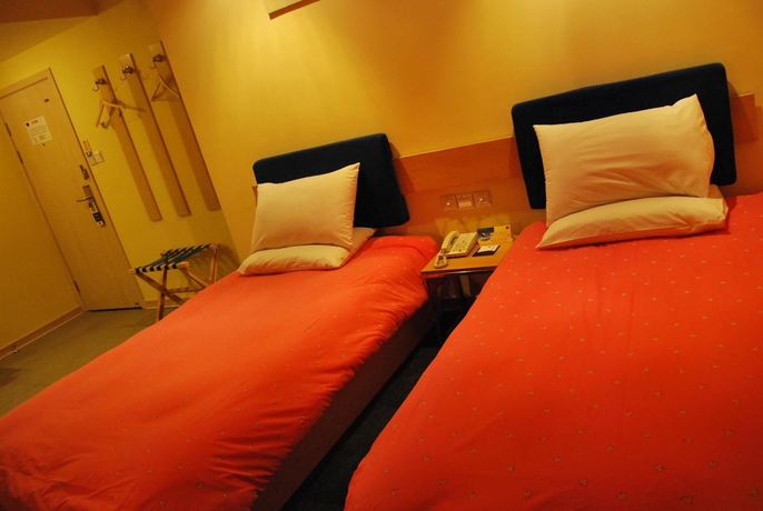 Imagen de la habitación del Hotel Home Inn Yanan West Road. Foto 9