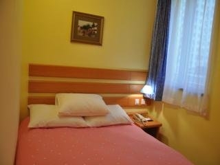 Imagen de la habitación del Hotel Home Inn Yanshaxinyuanli. Foto 4