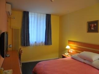 Imagen de la habitación del Hotel Home Inn Yanshaxinyuanli. Foto 5