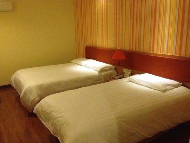 Imagen de la habitación del Hotel Home Inn Yantai Yingchun Avenue. Foto 8