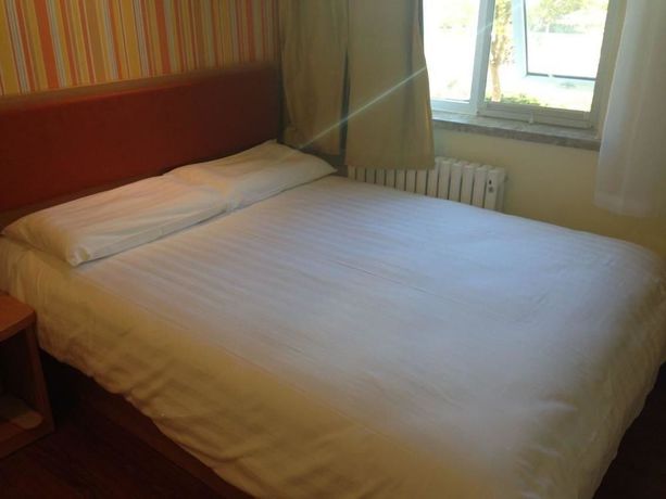 Imagen de los interiores del Hotel Home Inn Yantai Yingchun Avenue. Foto 15