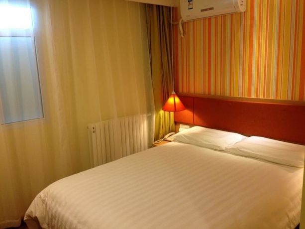 Imagen de la habitación del Hotel Home Inn Yantai Yingchun Avenue. Foto 12