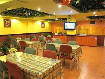 Imagen del bar/restaurante del Hotel Home Inn Zhangzhou Yanan North Road. Foto 7