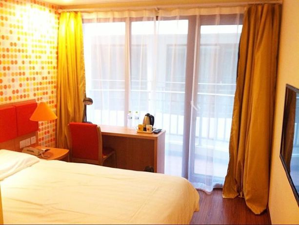 Imagen de la habitación del Hotel Home Inn Zhongshan Road. Foto 7