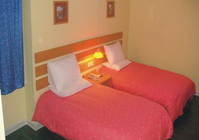 Imagen de la habitación del Hotel Home Inn Zuojiazhuang - Beijing. Foto 5