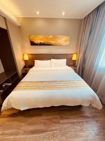 Imagen de la habitación del Hotel Home Inns Collection. Foto 18