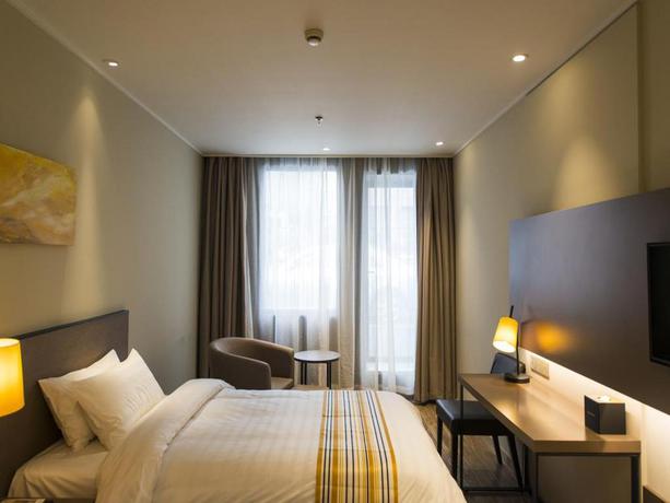 Imagen general del Hotel Home Inns Plus Shanghai Xujiahui Branch. Foto 3