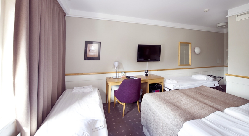 Imagen de la habitación del Hotel Home Kompaniet. Foto 9