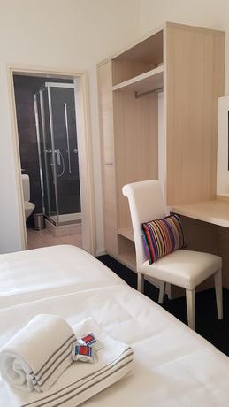 Imagen de la habitación del Hotel @ Home Locarno. Foto 12