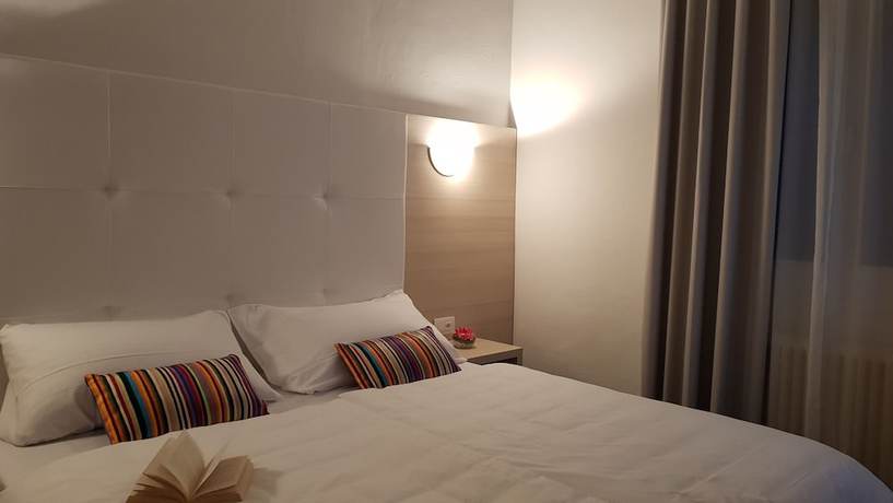 Imagen de la habitación del Hotel @ Home Locarno. Foto 13