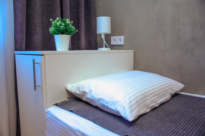 Imagen de la habitación del Hotel Home, Magnitogorsk. Foto 10