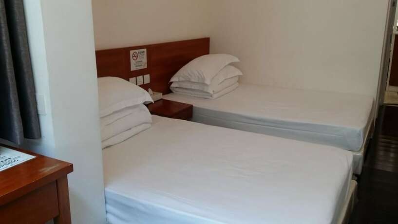 Imagen de la habitación del Hotel Home Of Macau. Foto 3