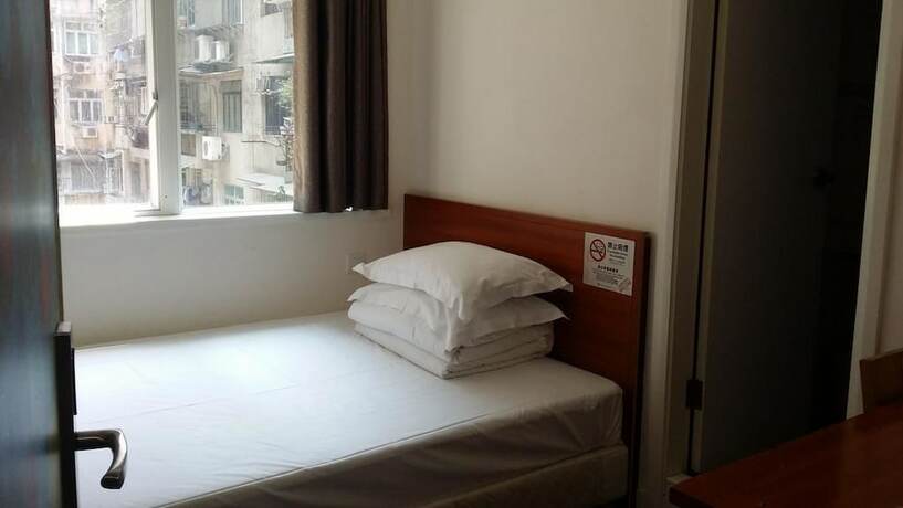 Imagen de la habitación del Hotel Home Of Macau. Foto 5