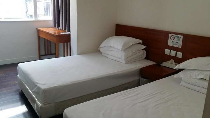 Imagen de la habitación del Hotel Home Of Macau. Foto 10