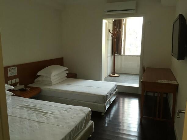 Imagen de la habitación del Hotel Home Of Macau. Foto 11