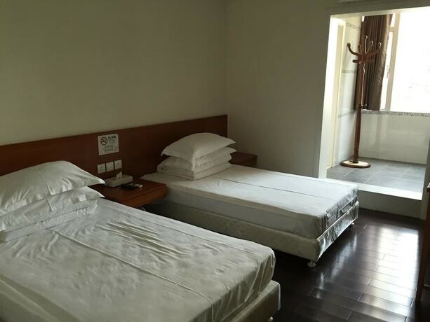 Imagen de la habitación del Hotel Home Of Macau. Foto 15