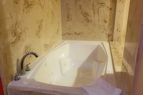 Imagen de la habitación del Hotel Home Place Inn. Foto 3