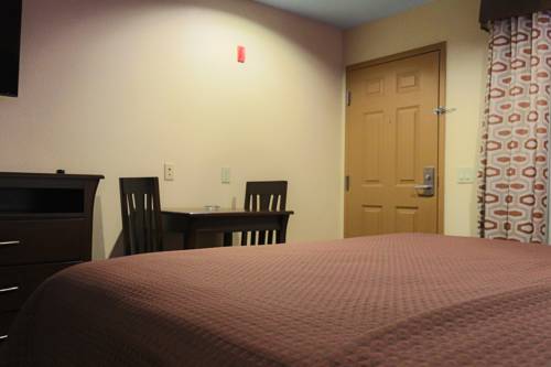 Imagen de la habitación del Hotel Home Place Inn. Foto 4