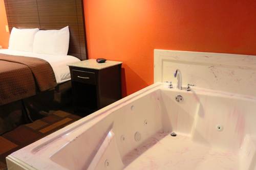 Imagen de la habitación del Hotel Home Place Inn. Foto 5