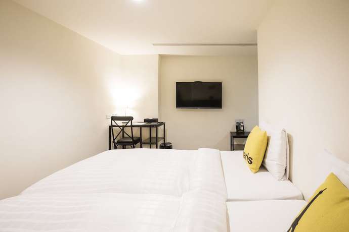 Imagen de la habitación del Hotel Home Rest. Foto 9